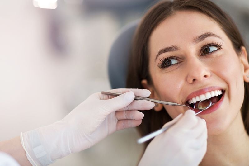 Woman Getting Dental Checkup