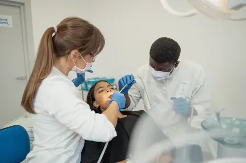 Women getting her teeth cleaned