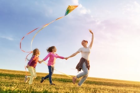 family flying kite