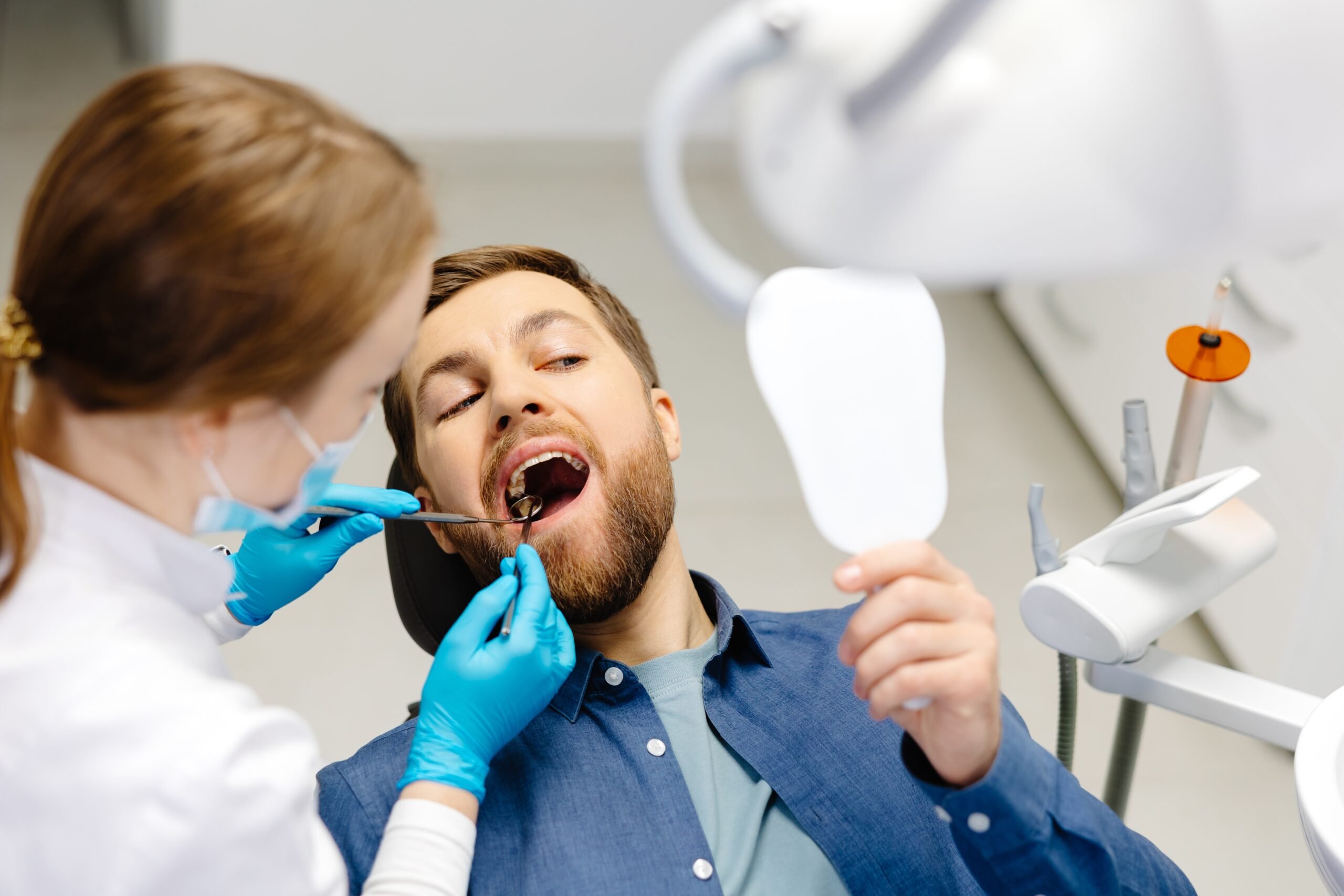 young man undergoing a dental exam in Los Angeles