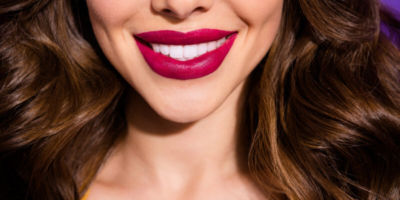 Cropped close-up view of an attractive smile