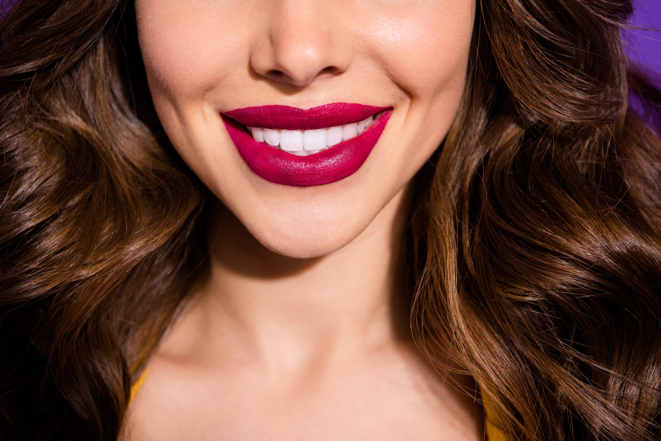 Cropped close-up view of an attractive smile