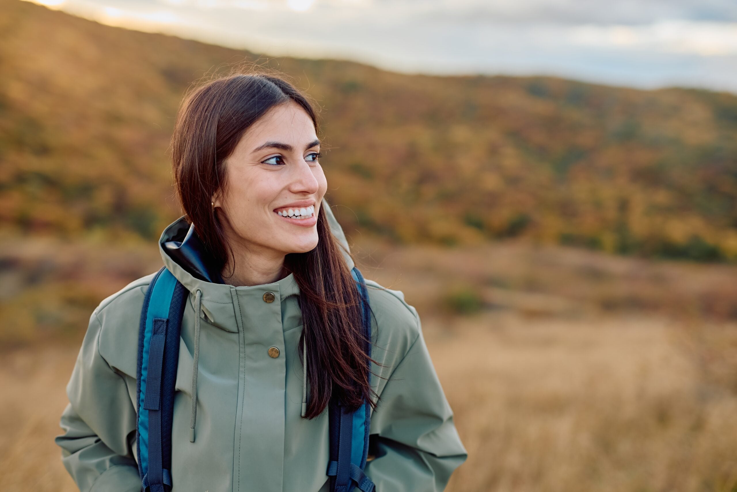 happy woman smiling outdoors, perfect smile