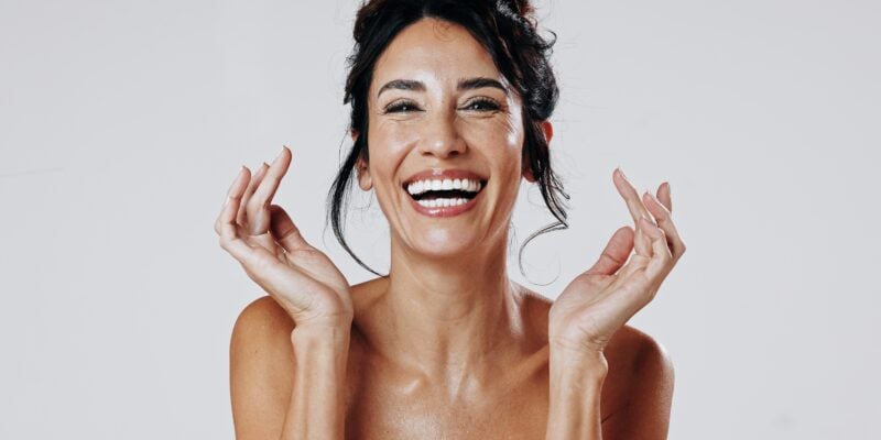 profile of a laughing woman, perfect dental veneers
